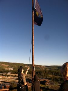 Kayla raising flags